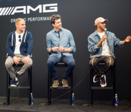 Lewis Hamilton, Toto Wolff and Valtteri Bottas sit speaking