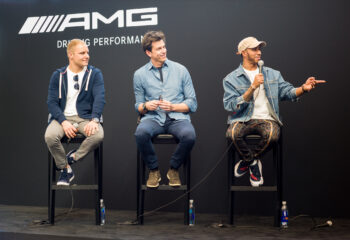 Lewis Hamilton, Toto Wolff and Valtteri Bottas sit speaking